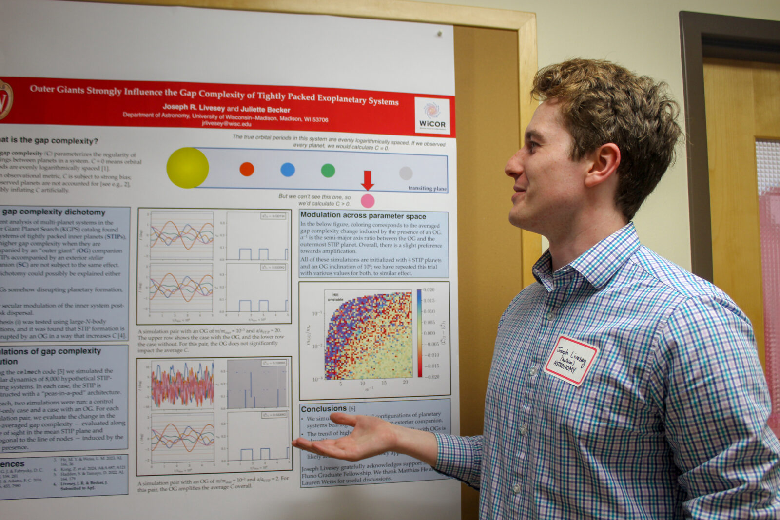 Graduate Student presents a poster at the WiCOR Launch event. (Photo by Paula Yu)