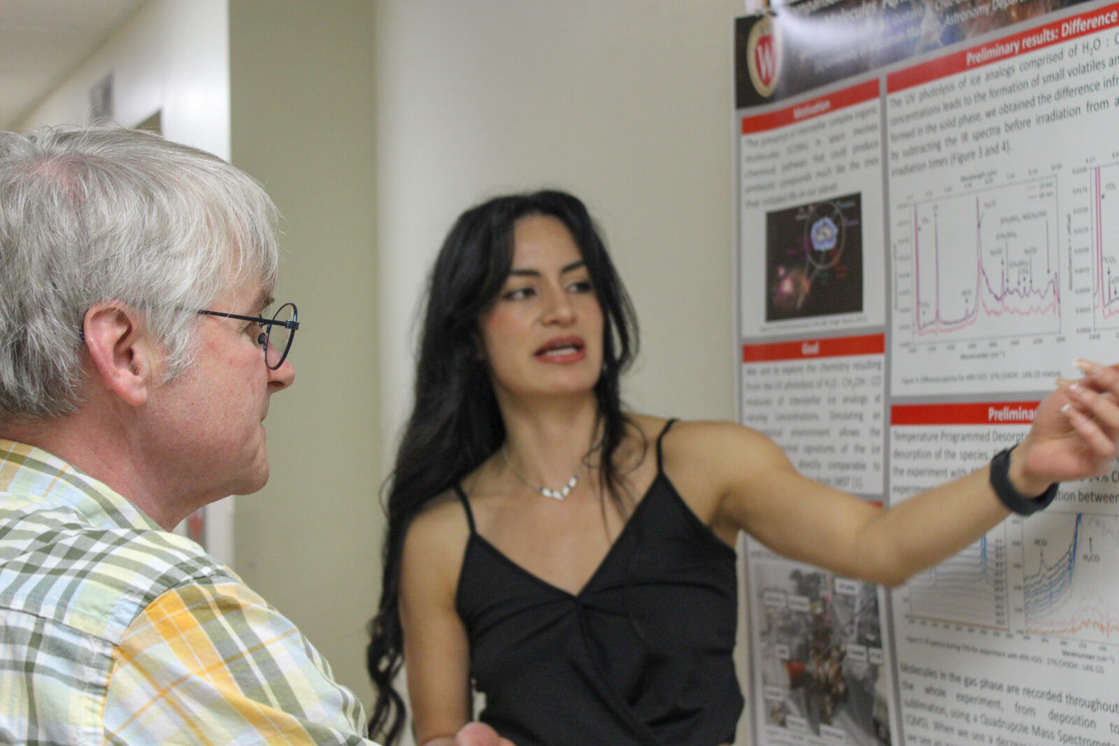 Graduate Student presents a poster at the WiCOR Launch event. (Photo by Paula Yu)